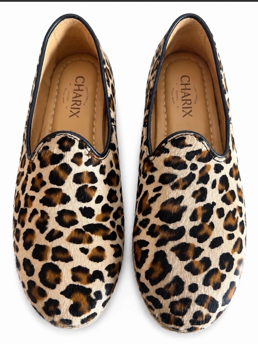 CHARIX Leopard-Print Flats in Tan and Black. Cowhide. Leather. Arch support.